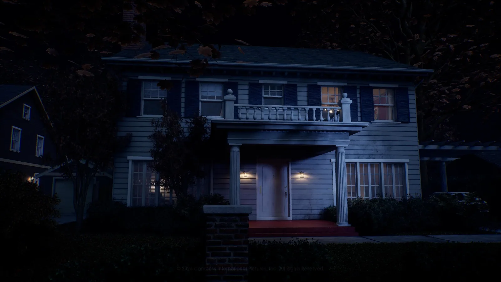 The two-story Doyle house at night in Orange Grove Estates