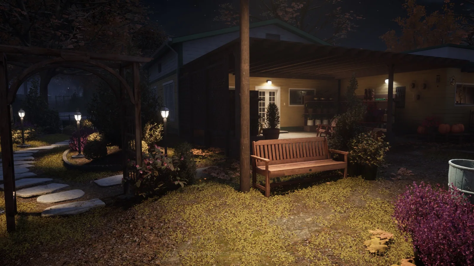 Lit garden center paths and benches in Haddonfield Town Center at night